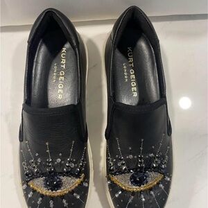 Kurt Geiger Black Slip-On Sneakers with Eye Design
